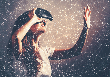 young woman-VR-headset_2_web-shutterstock_552221818